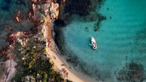 Sleeping on a boat in the bay Loiri Porto San Paolo